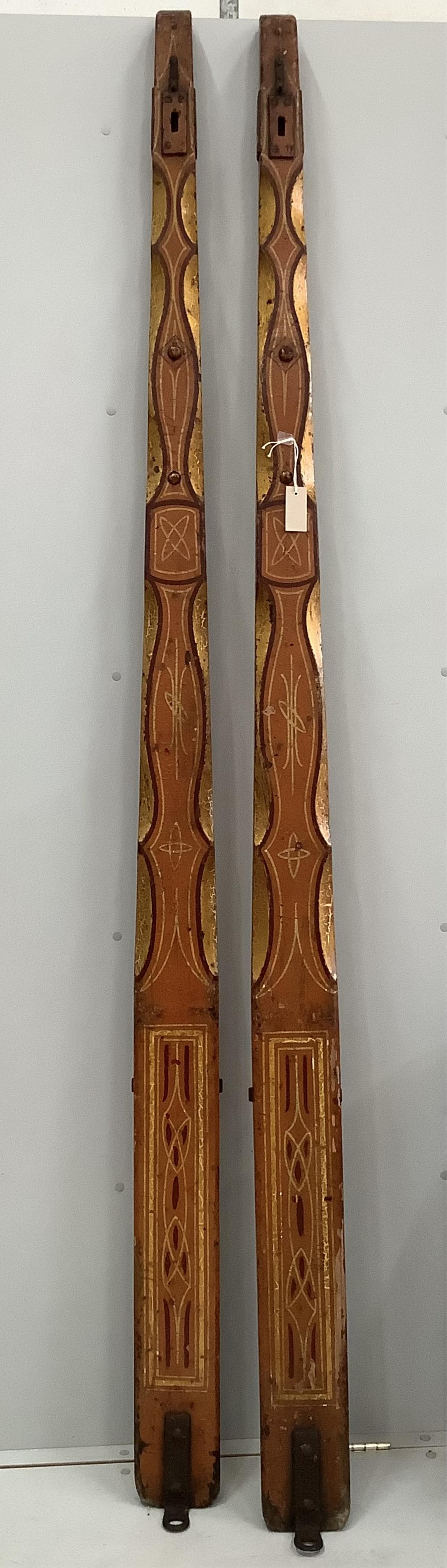 A pair of vintage painted wood fairground panel posts, height 236cm. Condition - fair